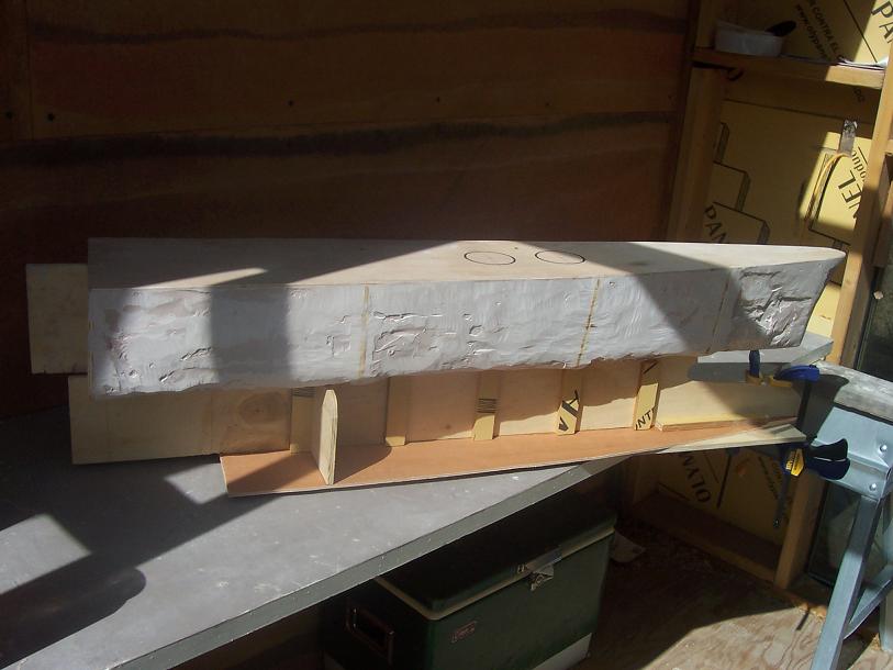 I used the 60+ lbs bow section to glue the keel runner to the aft deck section.